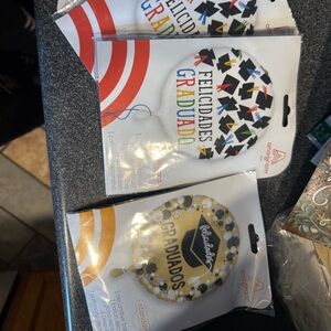 3 graduation balloons in Spanish